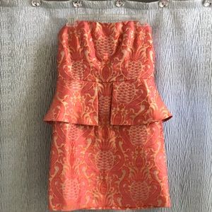 Strapless peplum evening dress,